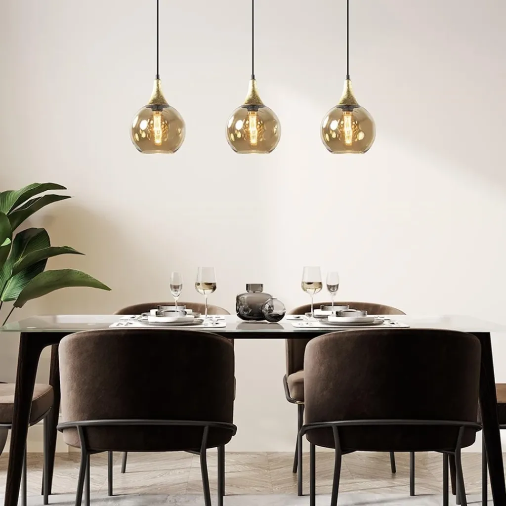 Chique 3-lichts hanglamp zwart/goud met amber glas>Straluma Outlet