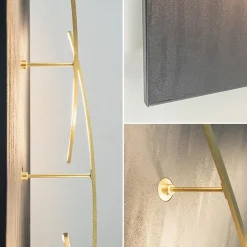 Grote design wandlamp met gouden kapjes><noscript><img width=