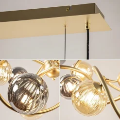 Grote hanglamp goud met amber/smoke glazen bollen><noscript><img width=